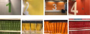 Image showing green, yellow, orange and red books and floor numbers 1 through 4 in the matching color.