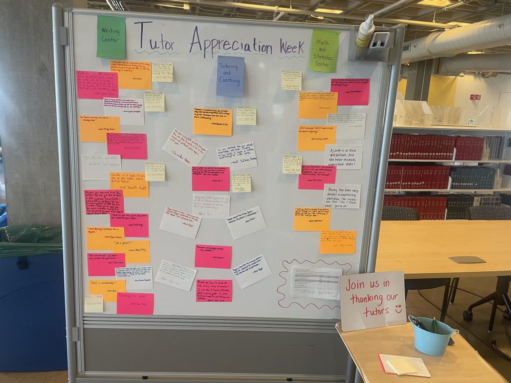 whiteboard with colored sticky notes containing thank you comments from students to tutors