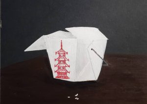 Takeout box of Chinese food half open
