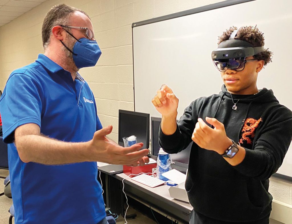 Instructor with Student wearing a VR headset