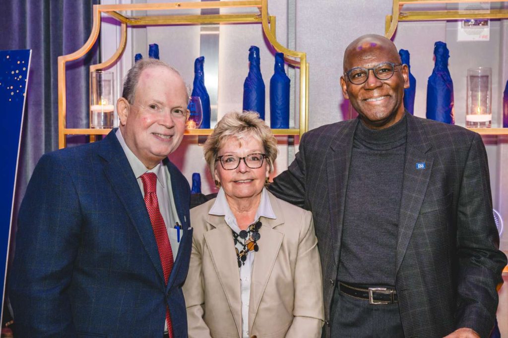 Richard Snellinger, B.S. ’78, Cathy Snellinger and Michael Curry, B.S. ’77,